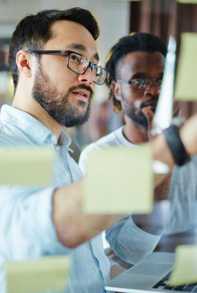 Professional Team Working with Sticky Notes